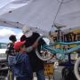 Bob Cormia of Calabazas Cyclery gave free bike-safety inspections and repairs, while grandson Jake Carnahan made sure chains were clean and oiled. 