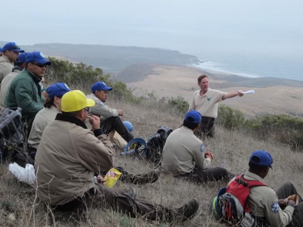 Rick Cooper of BLM welcomes a CCC crew made up of young veterans to a trail-building event at Coast Dairies on Saturday, Oct. 3. Photo courtesy Conservation Lands Foundation