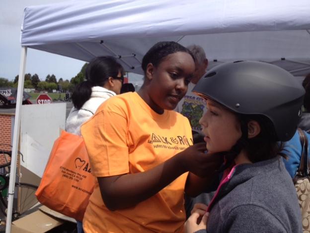 Carefully fitted free helmets were distributed to hundreds of kids.
