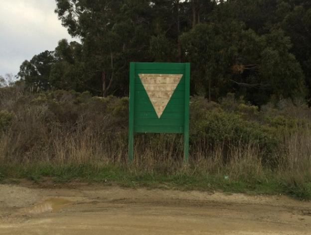 This sign just off Highway 1 marks Whitehouse Canyon Road. The trailhead is 2.5 miles up on the right. Allison TItus photo.